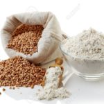 Buckwheat flour and buckwheat isolated on white background